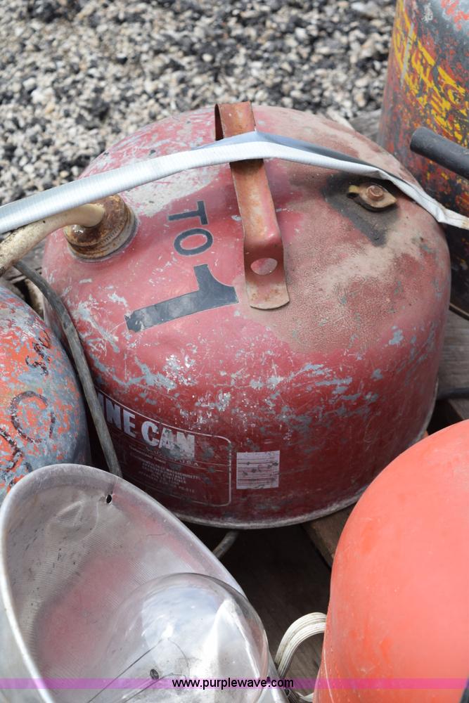 image for item BG9986 Assorted gas cans and fire hose