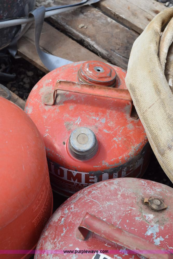 image for item BG9986 Assorted gas cans and fire hose
