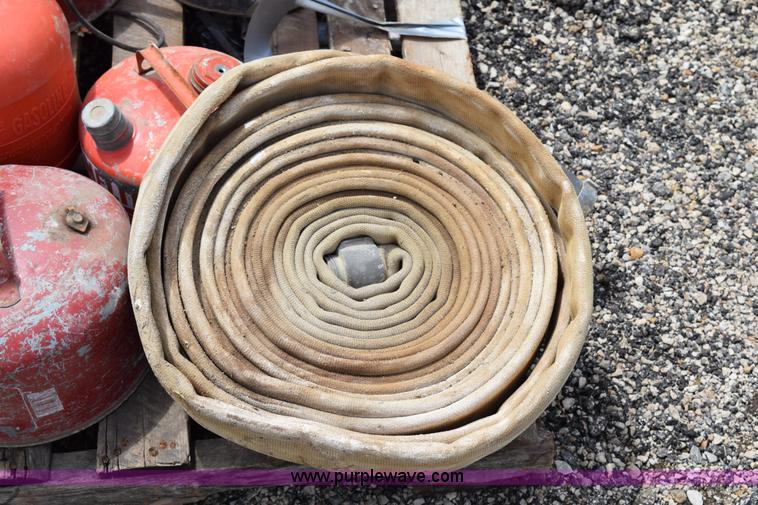 image for item BG9986 Assorted gas cans and fire hose