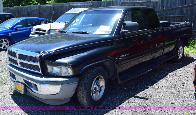 image for item J6606 1999 Dodge Ram 1500 Quad Cab pickup truck