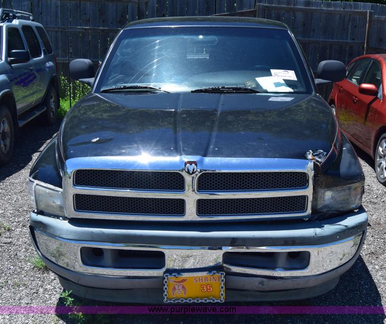 image for item J6606 1999 Dodge Ram 1500 Quad Cab pickup truck