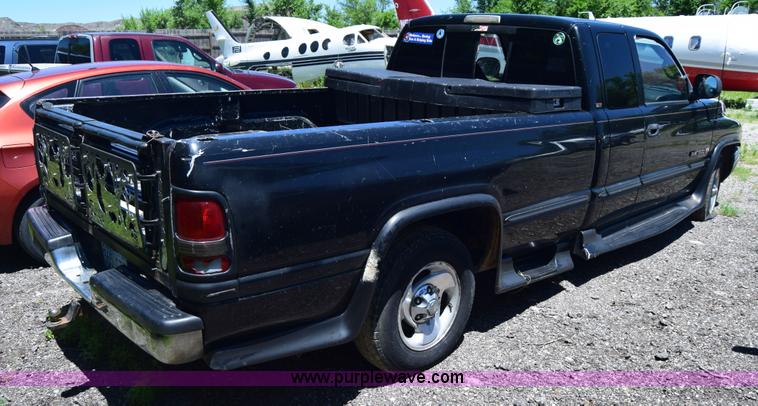 image for item J6606 1999 Dodge Ram 1500 Quad Cab pickup truck