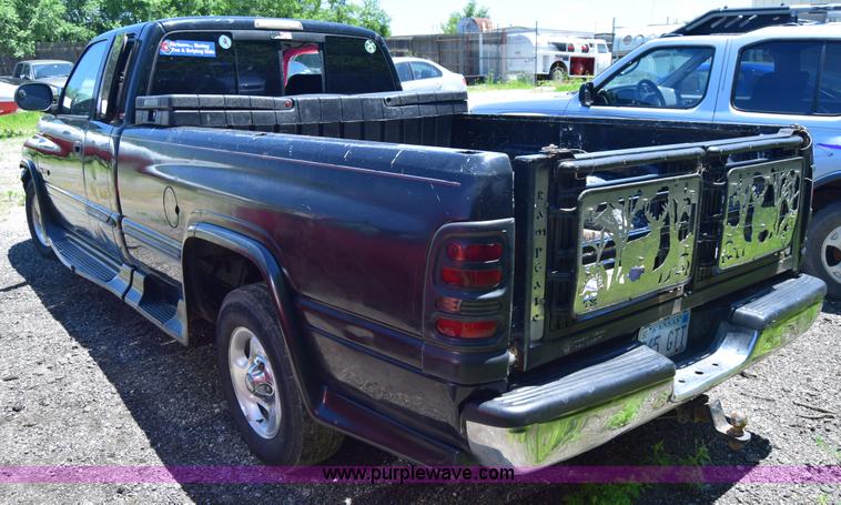 image for item J6606 1999 Dodge Ram 1500 Quad Cab pickup truck