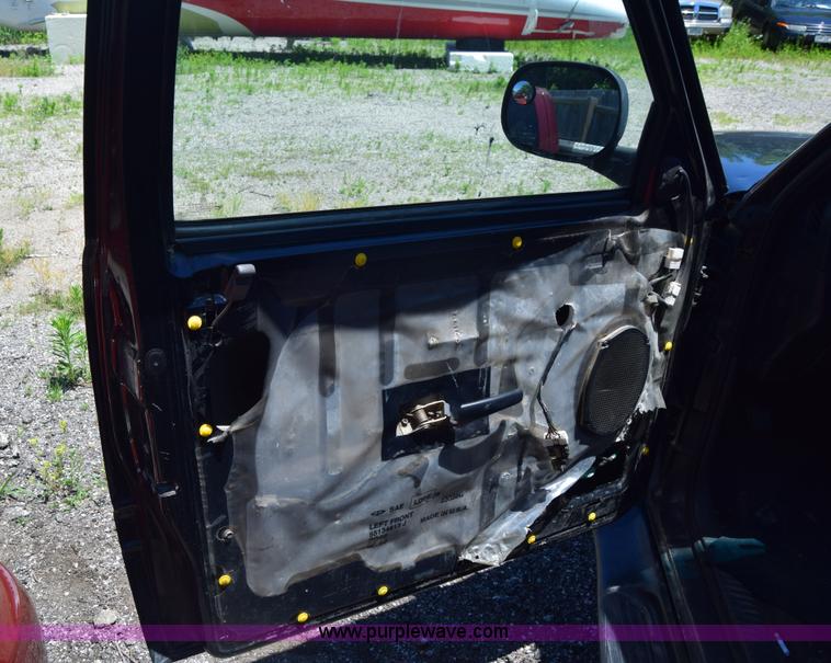 image for item J6606 1999 Dodge Ram 1500 Quad Cab pickup truck