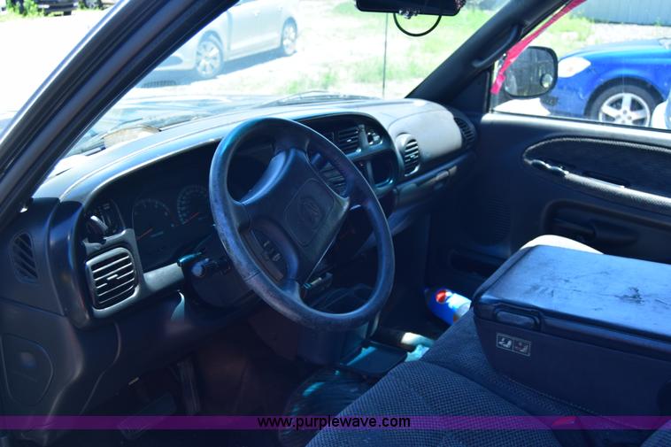 image for item J6606 1999 Dodge Ram 1500 Quad Cab pickup truck