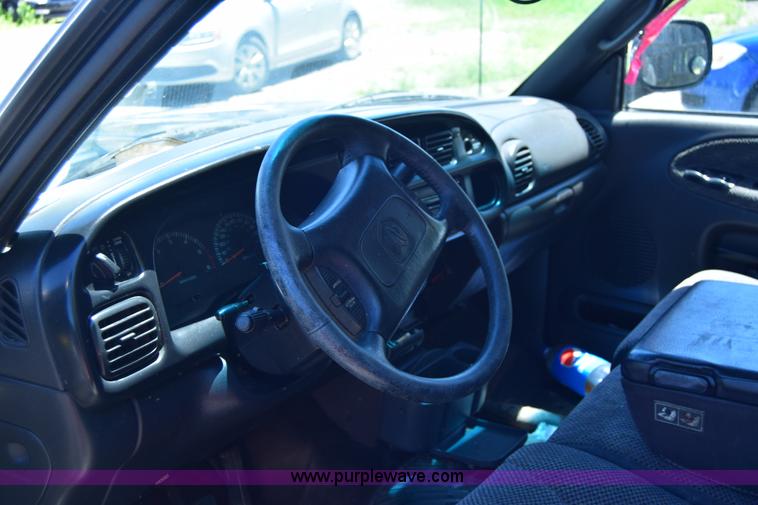 image for item J6606 1999 Dodge Ram 1500 Quad Cab pickup truck