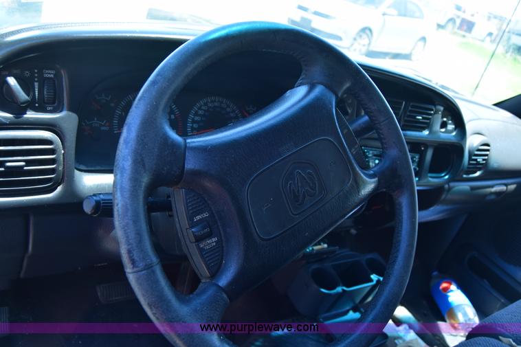 image for item J6606 1999 Dodge Ram 1500 Quad Cab pickup truck