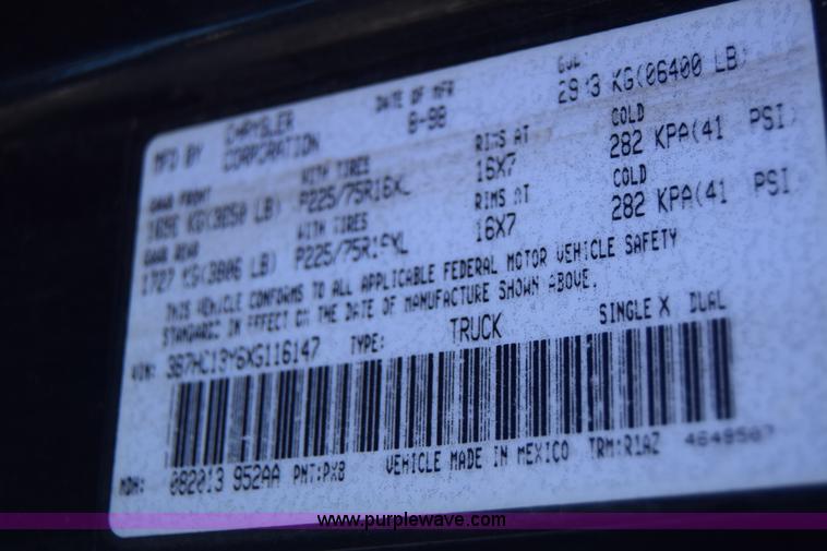 image for item J6606 1999 Dodge Ram 1500 Quad Cab pickup truck