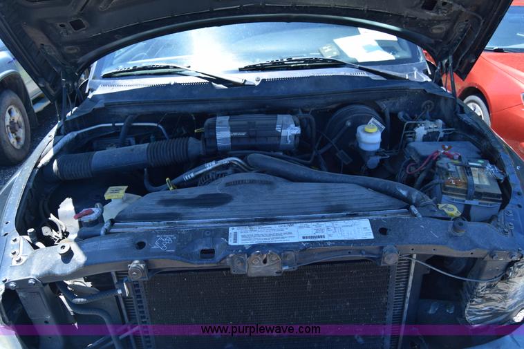 image for item J6606 1999 Dodge Ram 1500 Quad Cab pickup truck