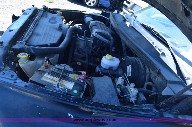 image for item J6606 1999 Dodge Ram 1500 Quad Cab pickup truck