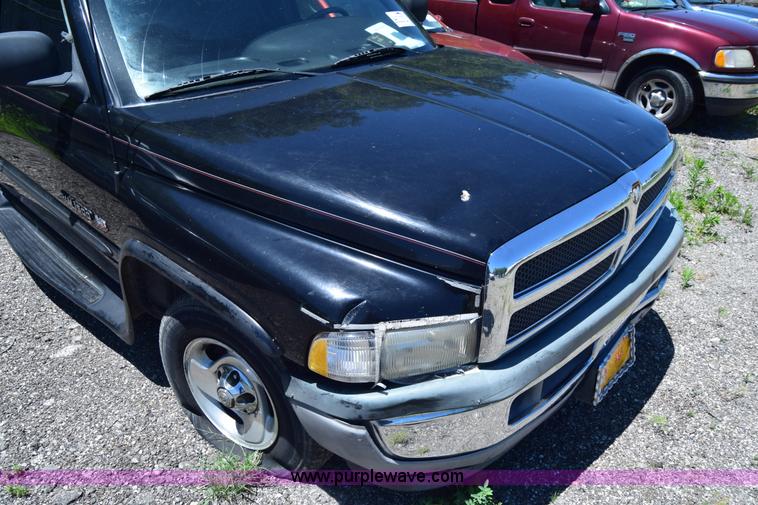 image for item J6606 1999 Dodge Ram 1500 Quad Cab pickup truck