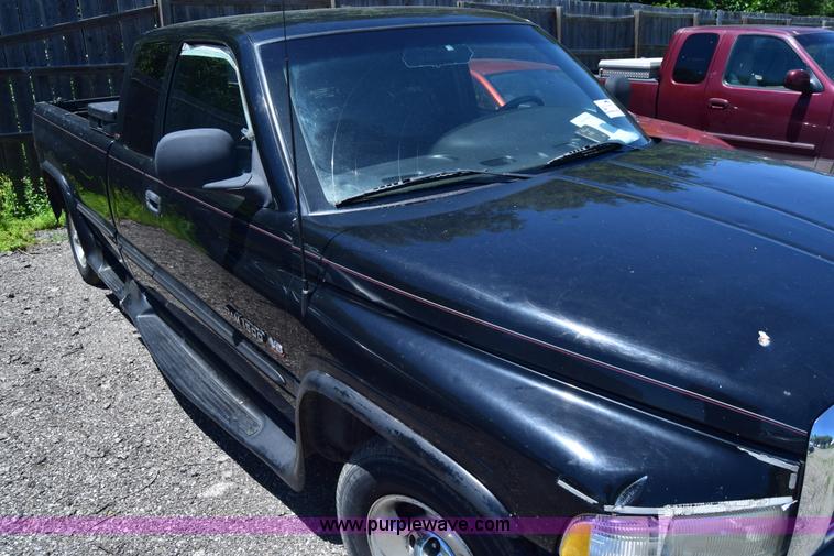 image for item J6606 1999 Dodge Ram 1500 Quad Cab pickup truck