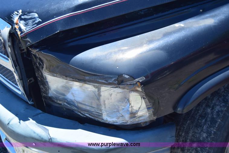 image for item J6606 1999 Dodge Ram 1500 Quad Cab pickup truck