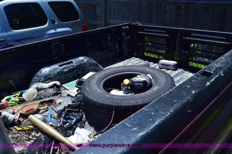 image for item J6606 1999 Dodge Ram 1500 Quad Cab pickup truck