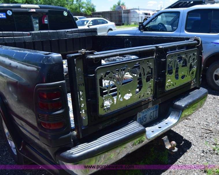 image for item J6606 1999 Dodge Ram 1500 Quad Cab pickup truck