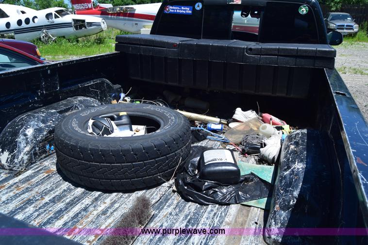 image for item J6606 1999 Dodge Ram 1500 Quad Cab pickup truck