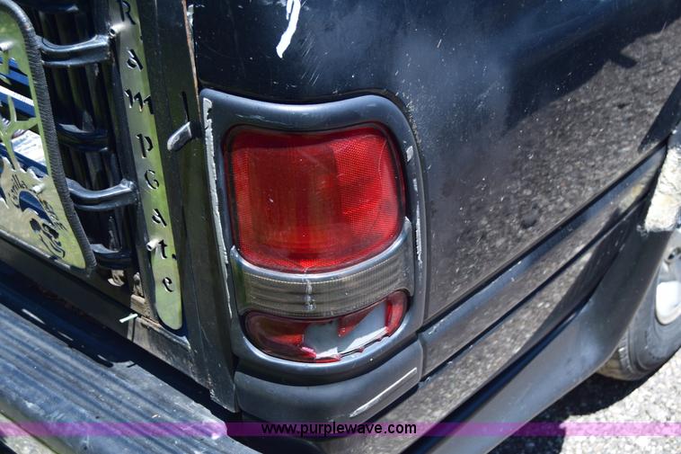 image for item J6606 1999 Dodge Ram 1500 Quad Cab pickup truck