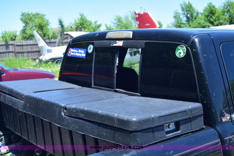 image for item J6606 1999 Dodge Ram 1500 Quad Cab pickup truck