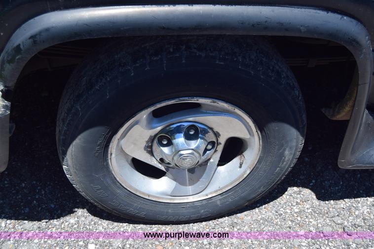 image for item J6606 1999 Dodge Ram 1500 Quad Cab pickup truck