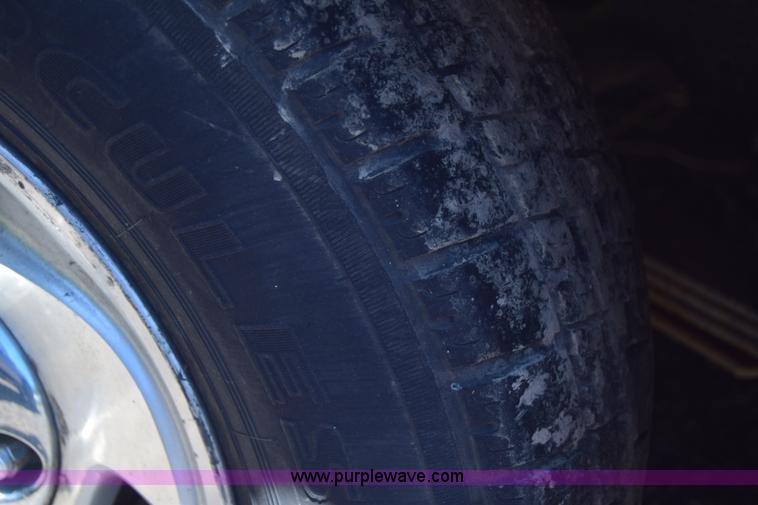 image for item J6606 1999 Dodge Ram 1500 Quad Cab pickup truck