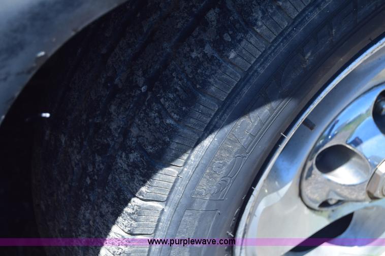 image for item J6606 1999 Dodge Ram 1500 Quad Cab pickup truck