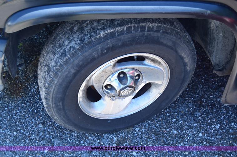 image for item J6606 1999 Dodge Ram 1500 Quad Cab pickup truck