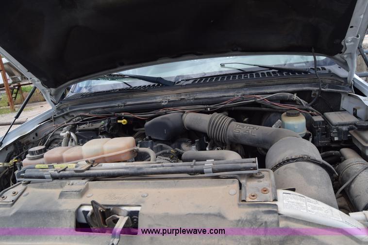 image for item J6638 2001 Ford F350 Super Duty flatbed pickup truck