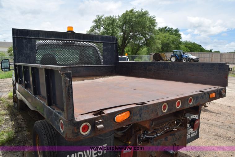 image for item J6638 2001 Ford F350 Super Duty flatbed pickup truck