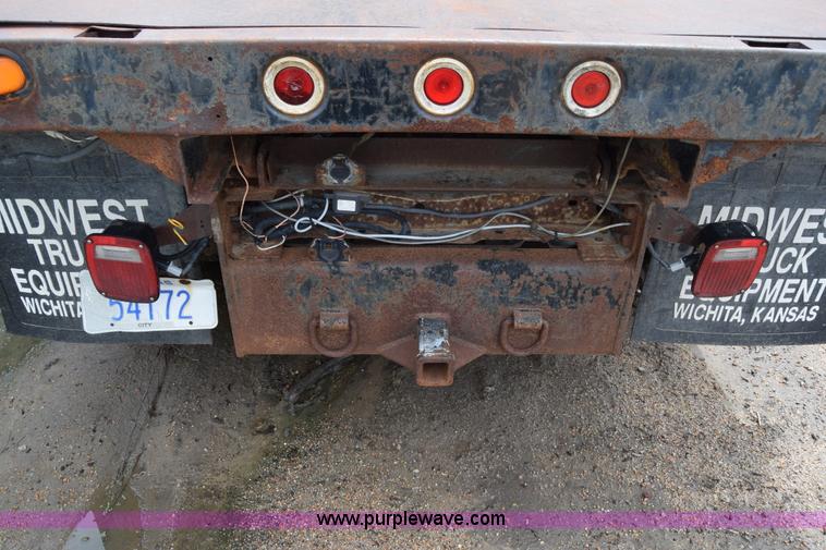 image for item J6638 2001 Ford F350 Super Duty flatbed pickup truck