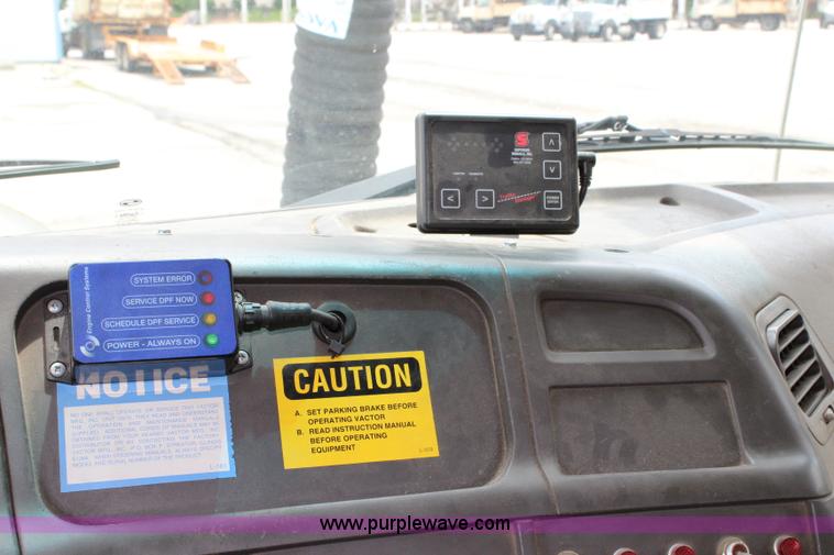 image for item K6002 2003 Sterling L7500 vacuum truck