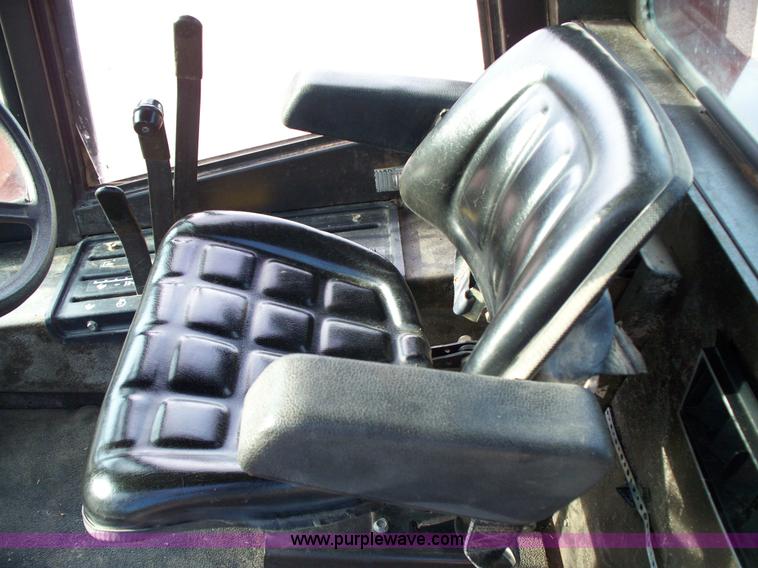 image for item D1554 1982 Hesston 6450 self-propelled windrower