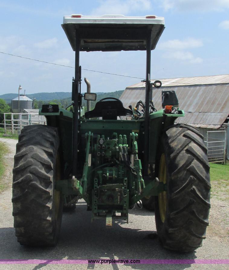 image for item J8533 2000 John Deere 6405 MFWD tractor