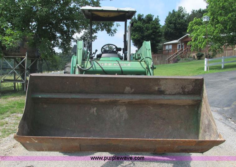 image for item J8533 2000 John Deere 6405 MFWD tractor