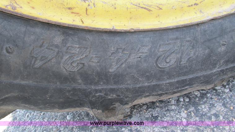 image for item J8533 2000 John Deere 6405 MFWD tractor