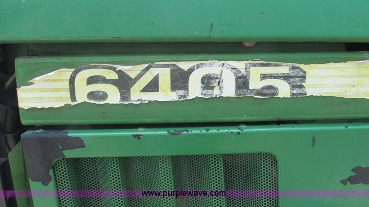 image for item J8533 2000 John Deere 6405 MFWD tractor