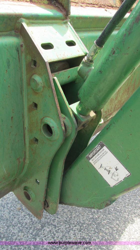 image for item J8533 2000 John Deere 6405 MFWD tractor