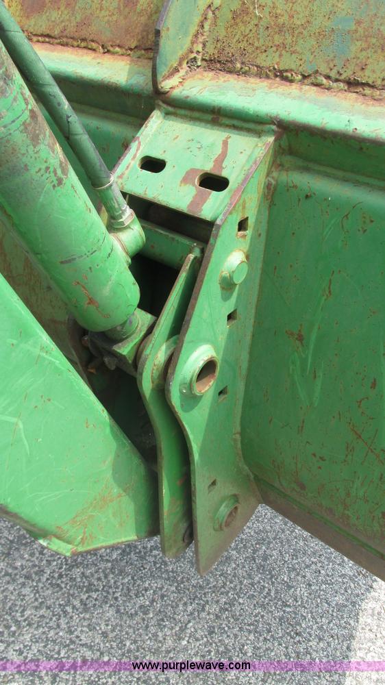 image for item J8533 2000 John Deere 6405 MFWD tractor
