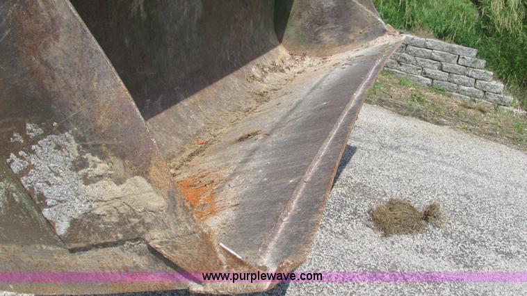 image for item J8533 2000 John Deere 6405 MFWD tractor