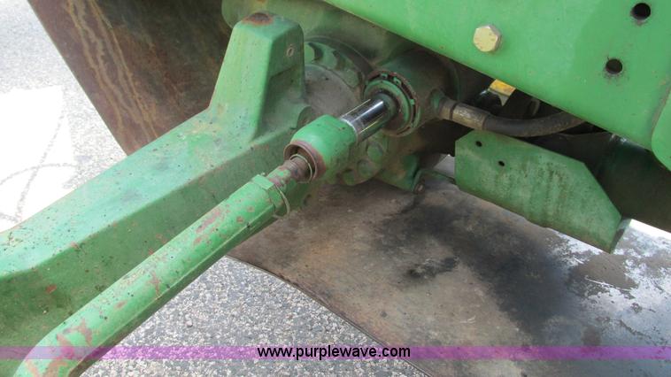 image for item J8533 2000 John Deere 6405 MFWD tractor