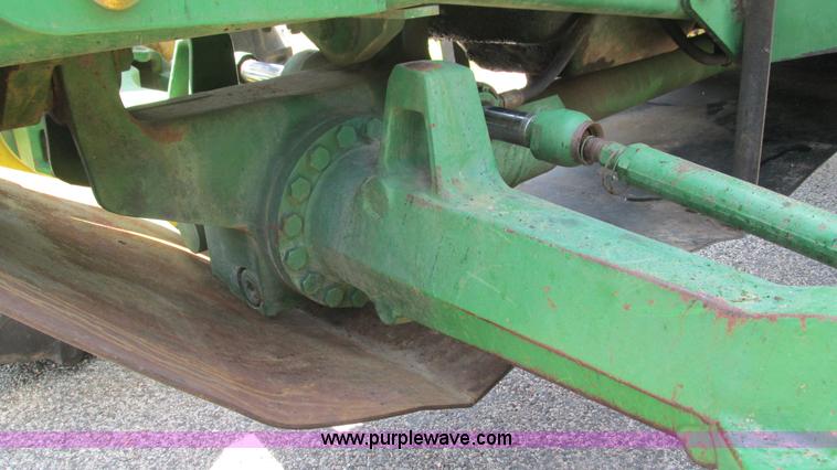 image for item J8533 2000 John Deere 6405 MFWD tractor