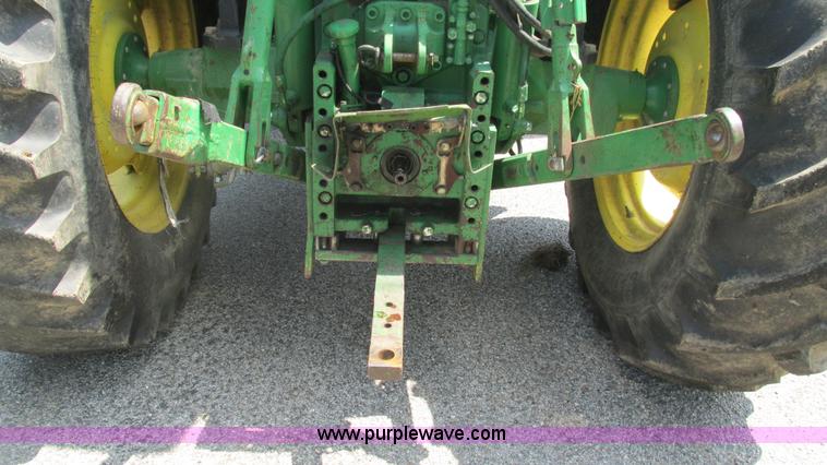 image for item J8533 2000 John Deere 6405 MFWD tractor