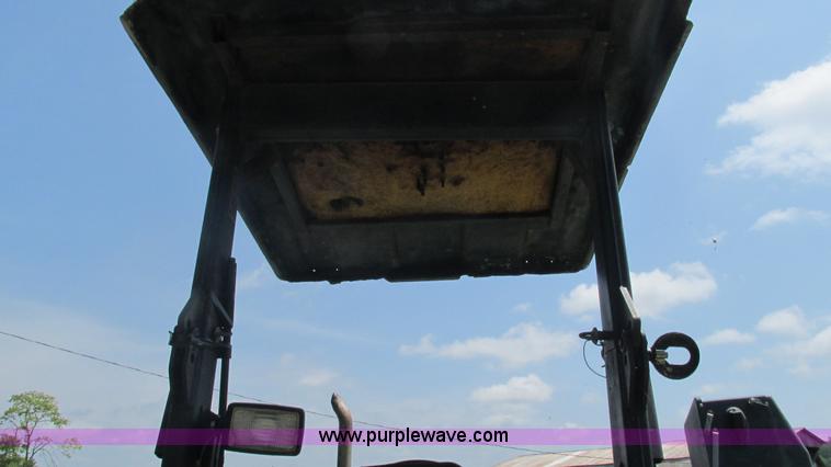 image for item J8533 2000 John Deere 6405 MFWD tractor