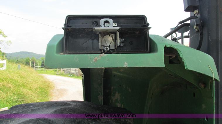 image for item J8533 2000 John Deere 6405 MFWD tractor