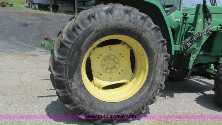 image for item J8533 2000 John Deere 6405 MFWD tractor