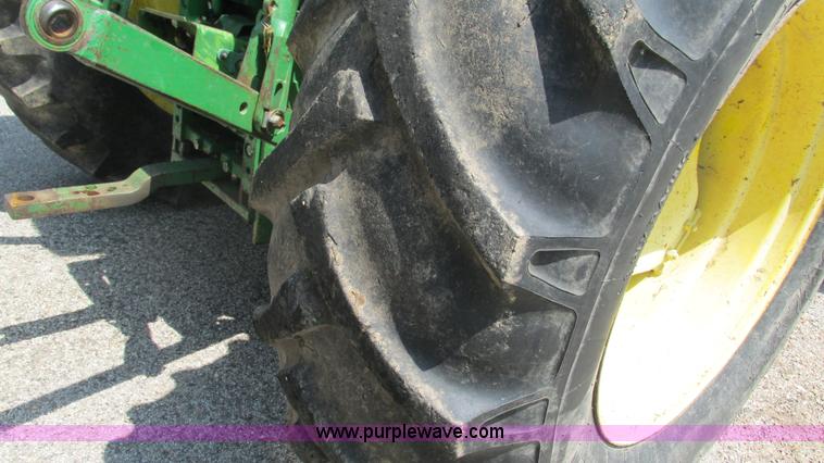 image for item J8533 2000 John Deere 6405 MFWD tractor