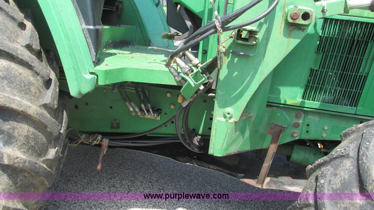 image for item J8533 2000 John Deere 6405 MFWD tractor