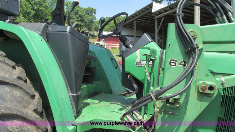 image for item J8533 2000 John Deere 6405 MFWD tractor