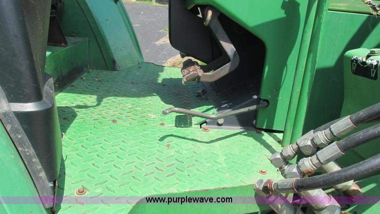 image for item J8533 2000 John Deere 6405 MFWD tractor