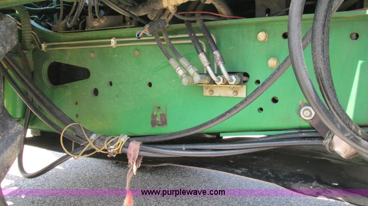 image for item J8533 2000 John Deere 6405 MFWD tractor