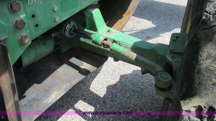 image for item J8533 2000 John Deere 6405 MFWD tractor